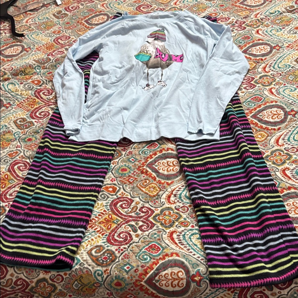 SO pajama set size medium with bird holding pillow and popcorn